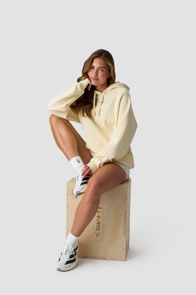 Everyday Hoodie Pale Lemon - Geel